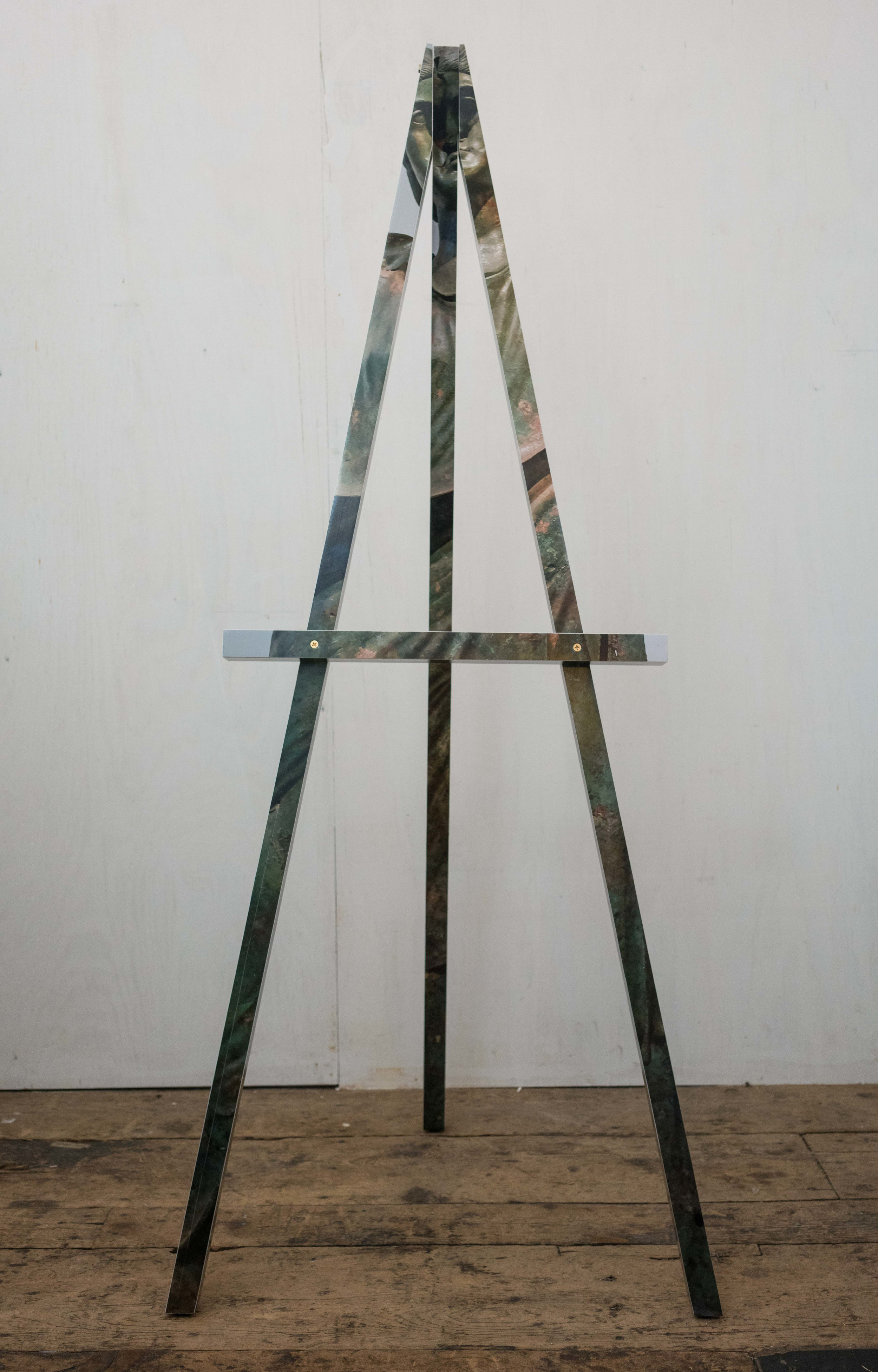 Easel (Damnatio Memoriae)     Color photograph mounted on wood with brass hardware 68 x 29 x 29 in
