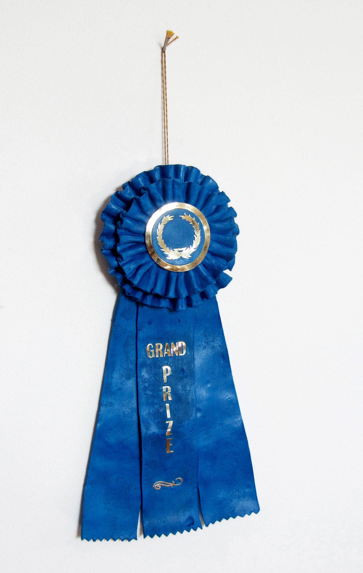 grand prize ribbon   Edition of 30 plastic, pigment, vinyl string &amp; paper  12 X 6 x 2 in